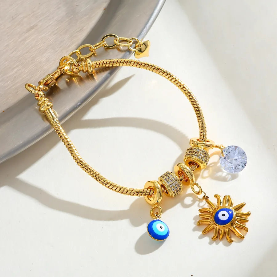 14K Gold Sun & Eye Charm Stainless Steel Bracelet