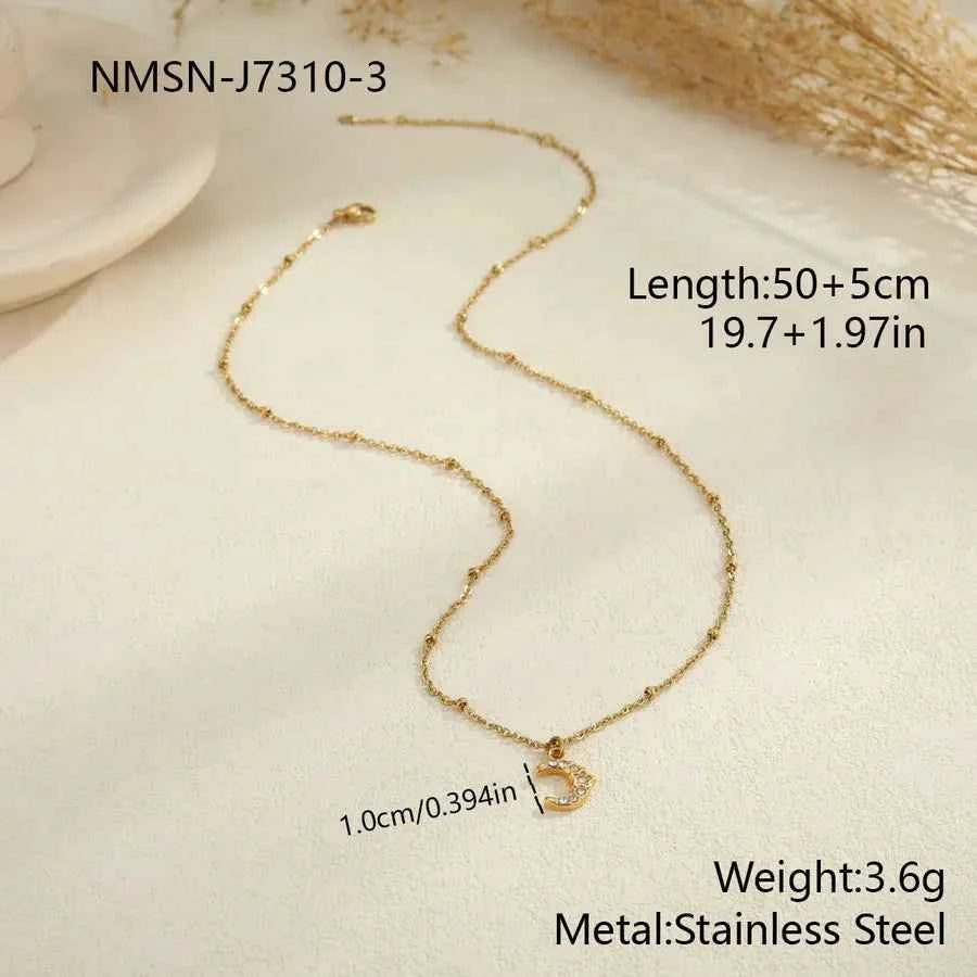 Gold Star & Moon Pendant Necklace