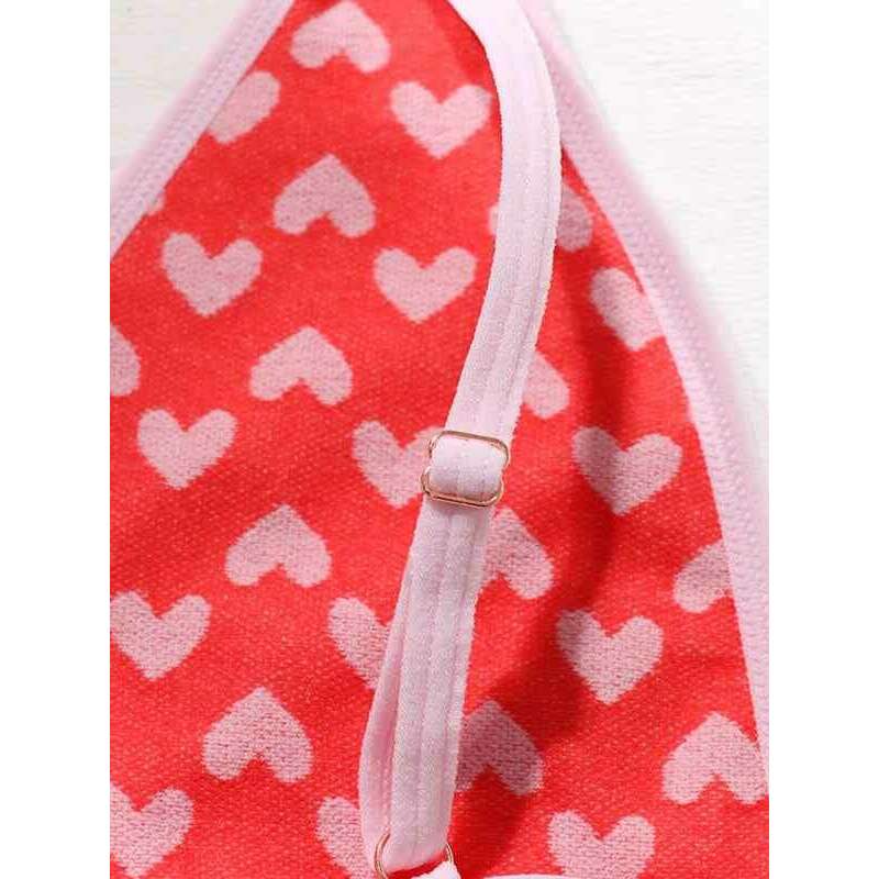 Close-up of Smiling Maria Valentine's lingerie set for women featuring a heart pattern design