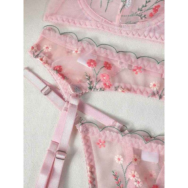 Smiling Maria embroidered mesh lingerie set in pink featuring floral designs and delicate straps