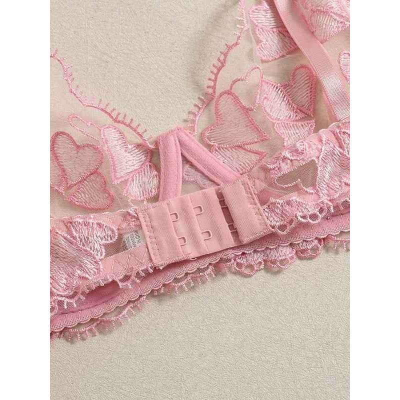 Smiling Maria heart shaped embroidered lingerie set featuring delicate pink lace and adjustable straps