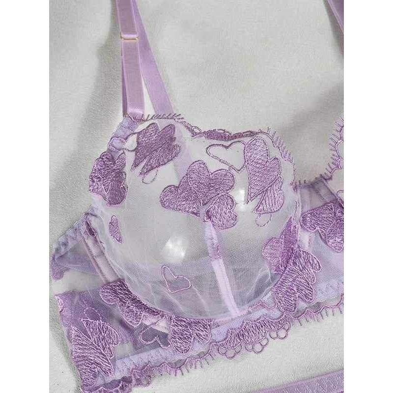 Heart shaped embroidered lingerie set in lavender with delicate heart patterns and sheer fabric