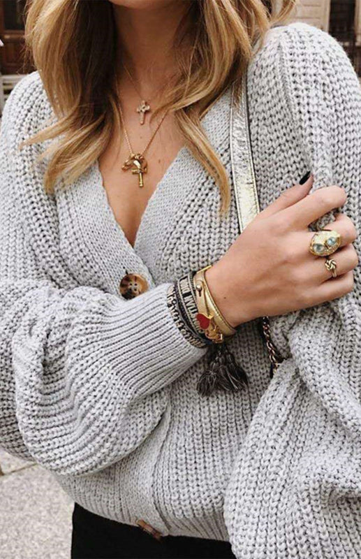 V-kaula-aukollinen lyhtyhihainen neulejakku