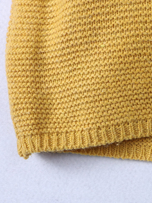 Huppumallinen neulottu napillinen neuletakki – Smiling Maria