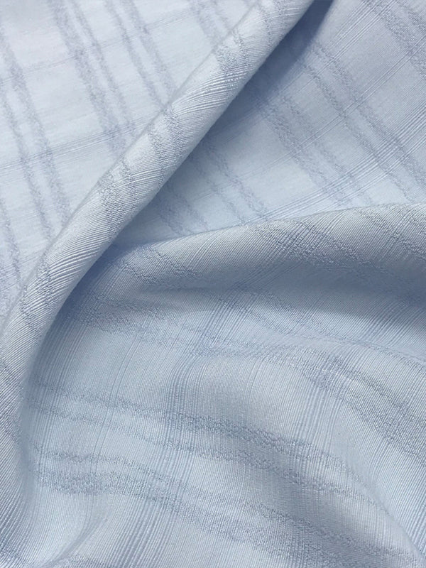 Camisa a cuadros con cuello en V y mangas cortas a rayas