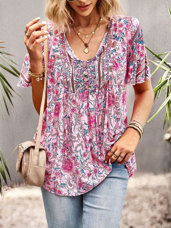 Blouse à manches courtes avec col en V et motif floral
