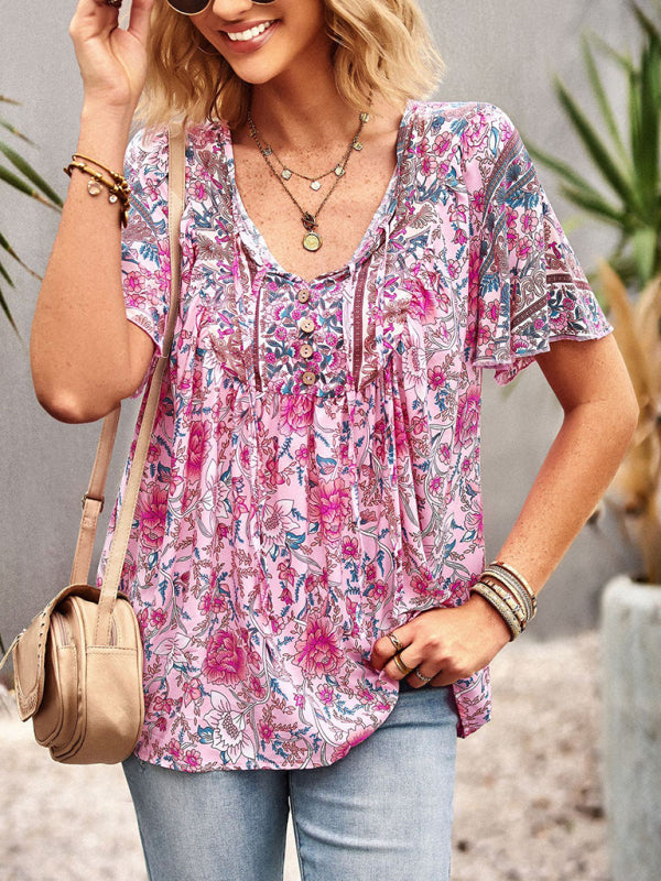 Blouse à manches courtes avec col en V et motif floral