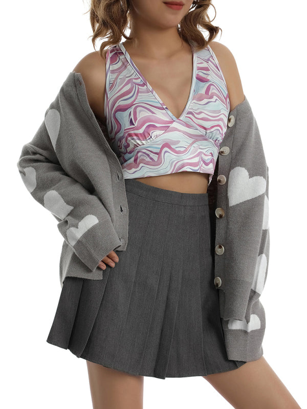 Neulottu sydännapillinen neuletakki