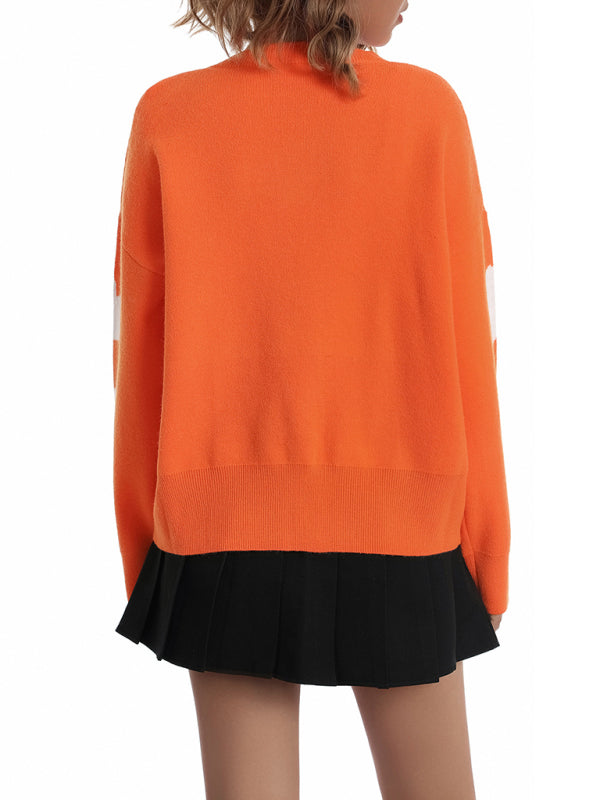 Neulottu sydännapillinen neuletakki