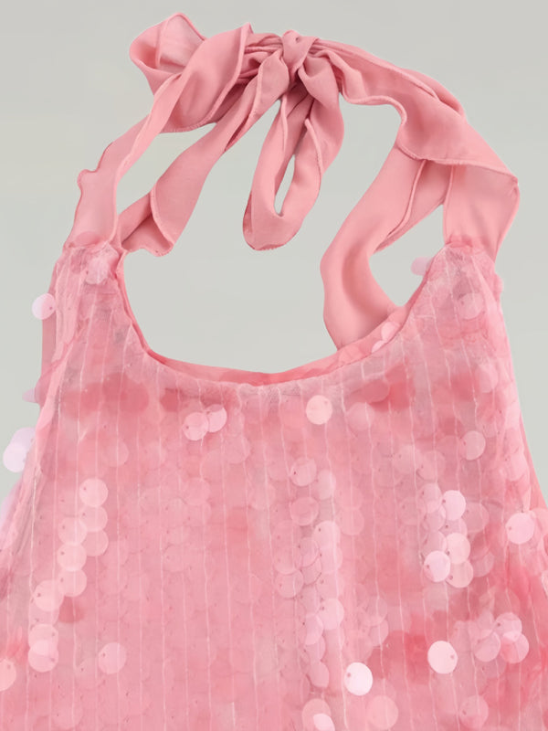 Vestido mini rosa con lentejuelas, halter y espalda descubierta