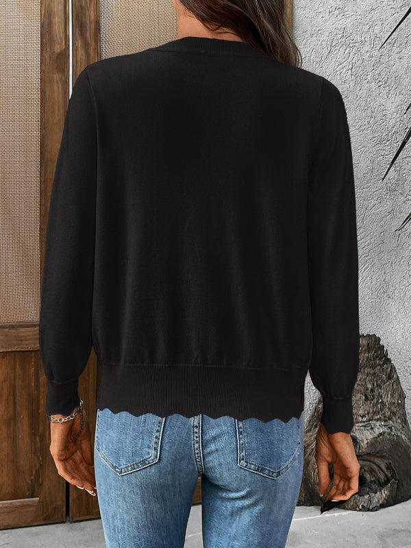 V-kaula-aukkoinen neulejakku pitkillä hihoilla