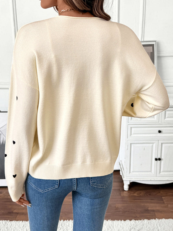 Gebreide V-hals cardigan trui met hartjespatroon