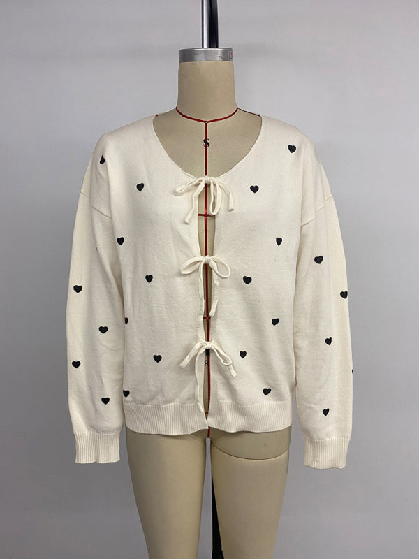 Gebreide V-hals cardigan trui met hartjespatroon