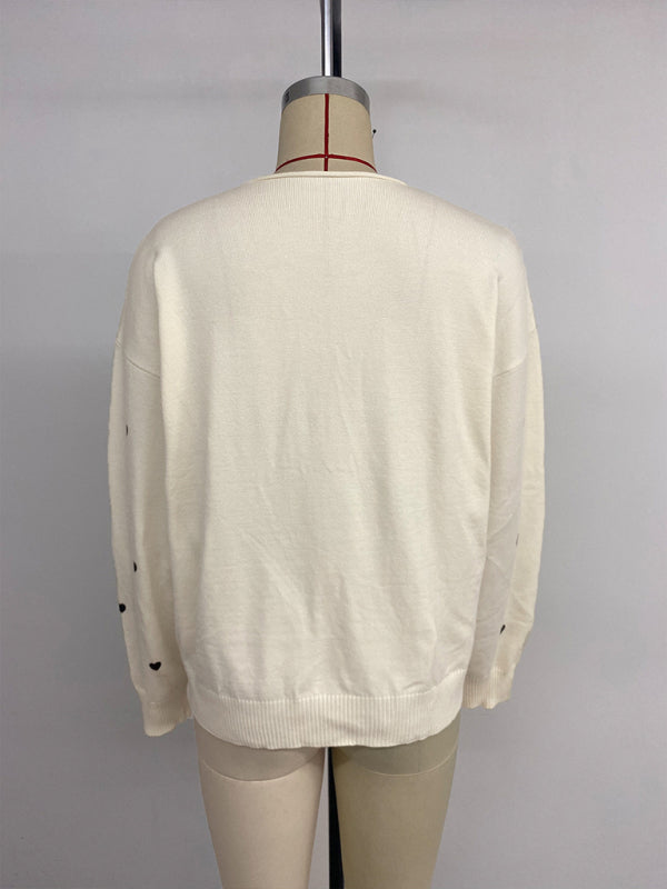Gebreide V-hals cardigan trui met hartjespatroon