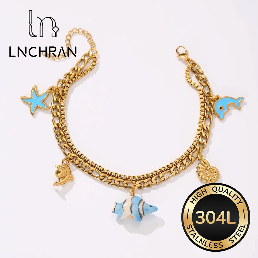 18K Gold Dolphin & Fish Charm Bracelet
