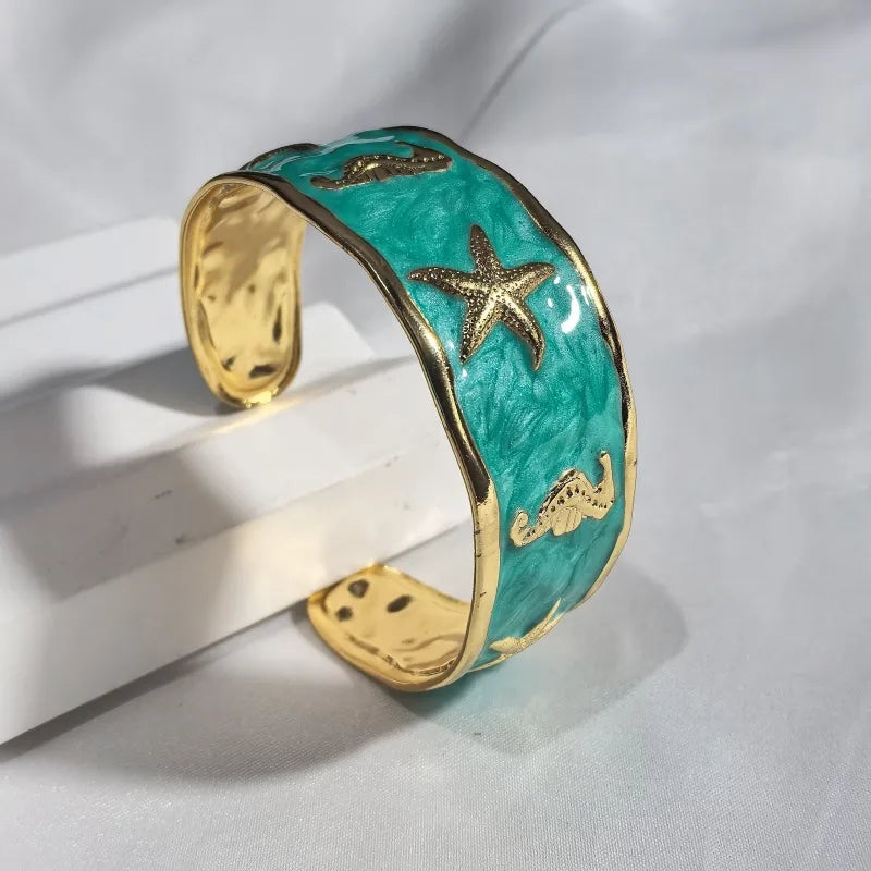 Gold Starfish & Seahorse Stainless Steel Bangle