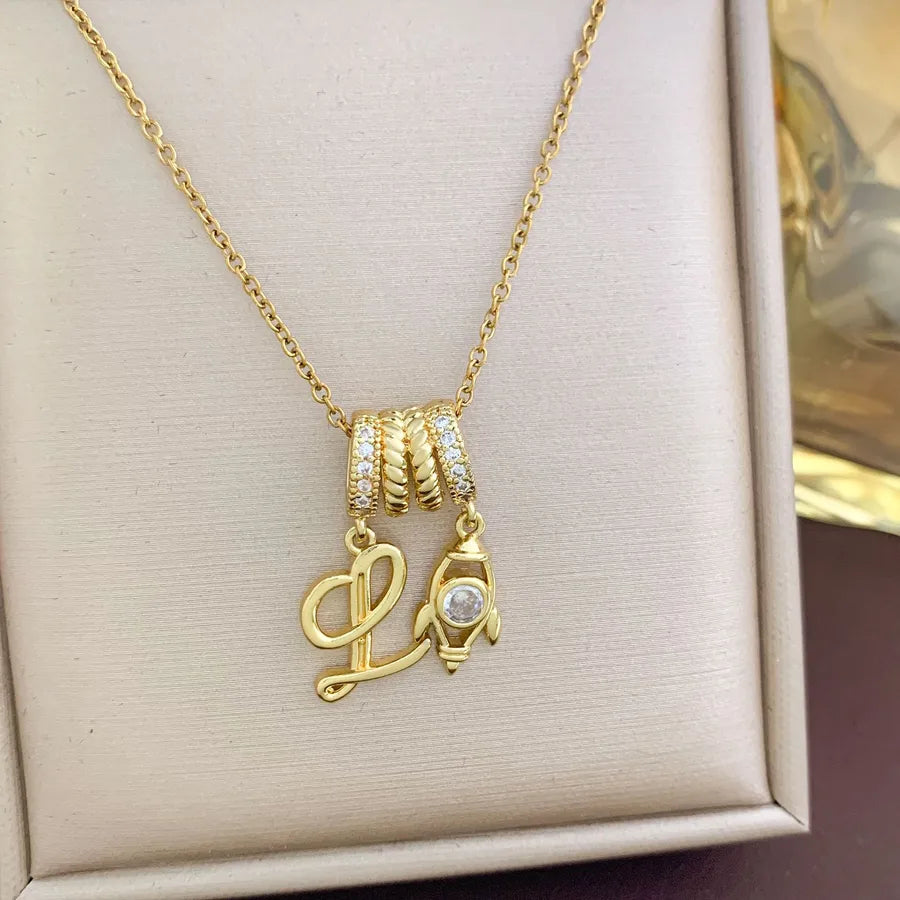 Aurora Star Pendant Necklace – Titanium & Zircon XL4466 Little Rocket Initial Necklace Gold