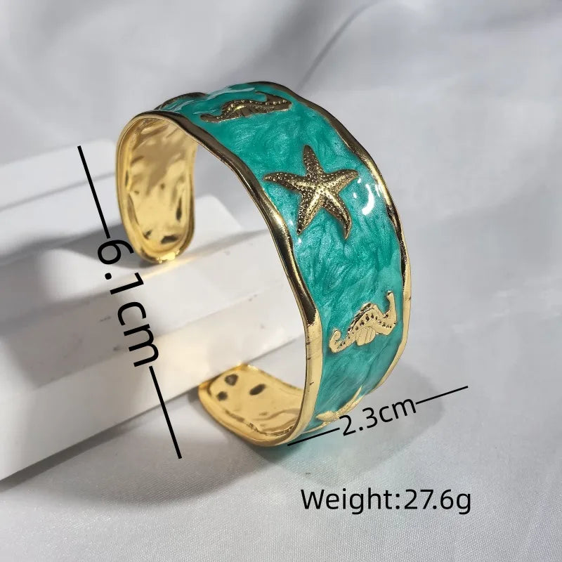 Gold Starfish & Seahorse Stainless Steel Bangle