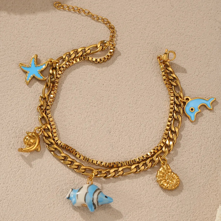 18K Gold Dolphin & Fish Charm Bracelet