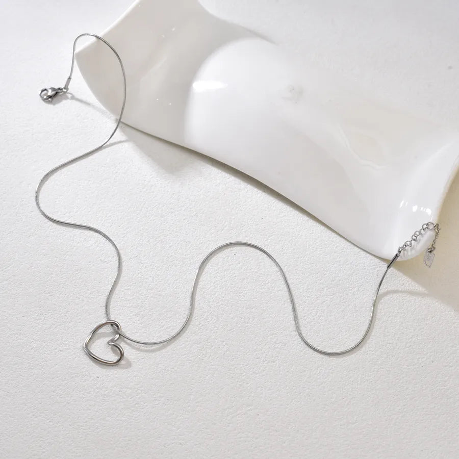 Gold Twisted Heart Pendant Necklace