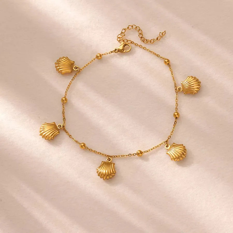 Gold Ocean Anklet with Dolphin & Starfish Charms