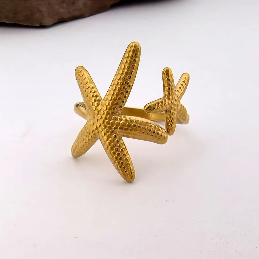 Adjustable Starfish & Shell Ring – Titanium Steel