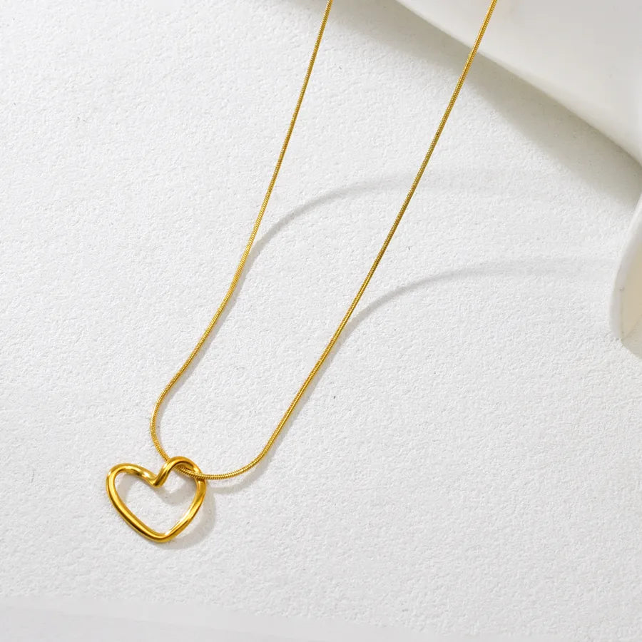 Gold Twisted Heart Pendant Necklace
