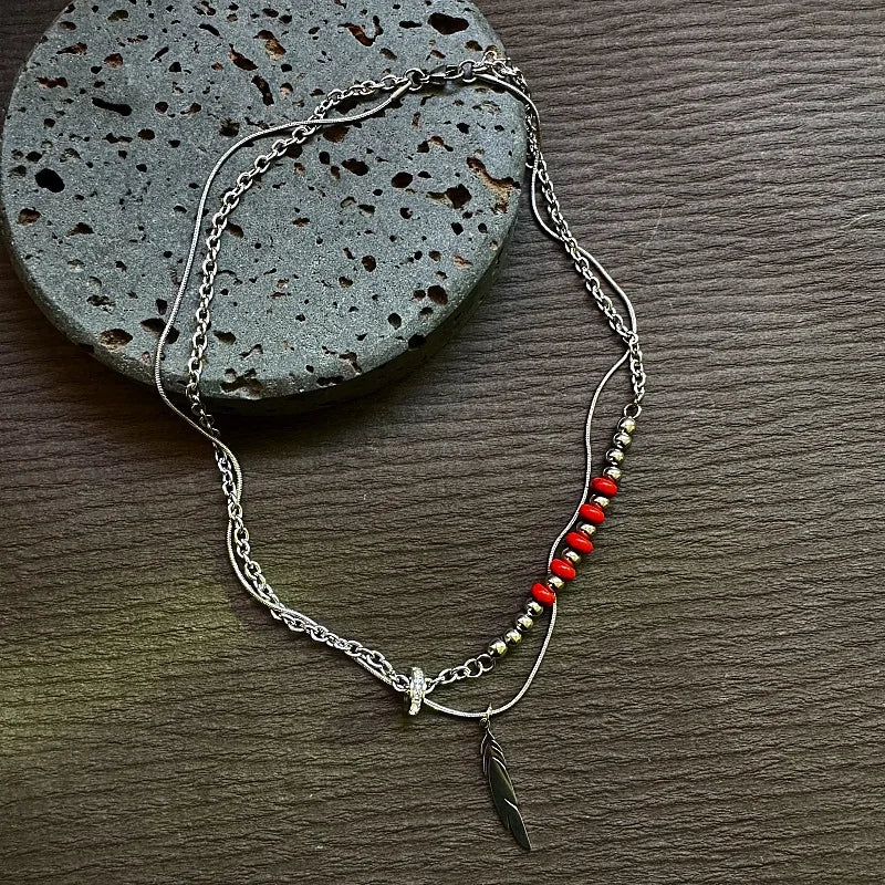 Red Stone Feather Pendant Titanium Necklace