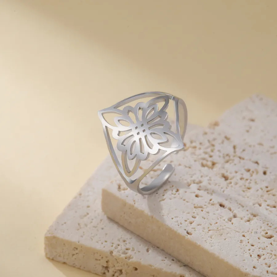 Hollow Flower Witch Knot Ring – Gold Stainless Steel