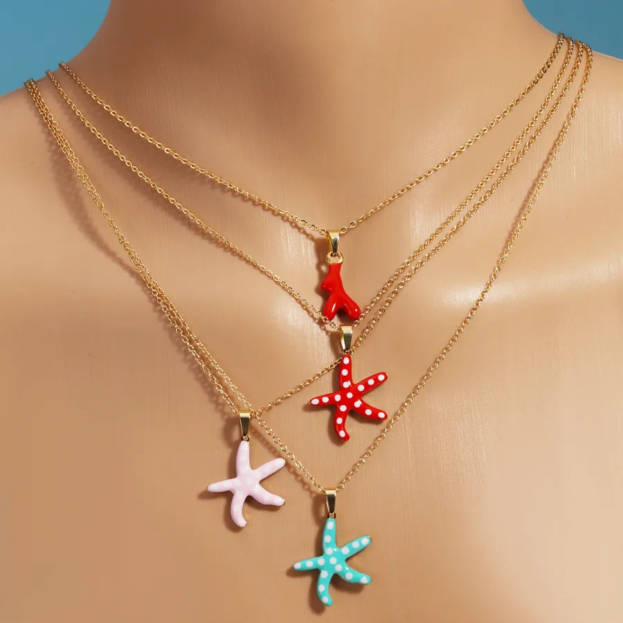 Gold Enamel Starfish Pendant Necklace