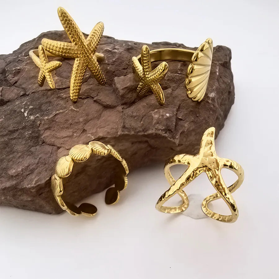 Adjustable Starfish & Shell Ring – Titanium Steel