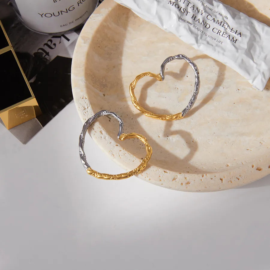Gold & Silver Twisted Heart Earrings