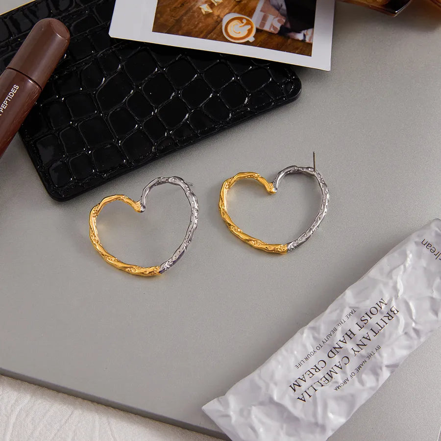 Gold & Silver Twisted Heart Earrings