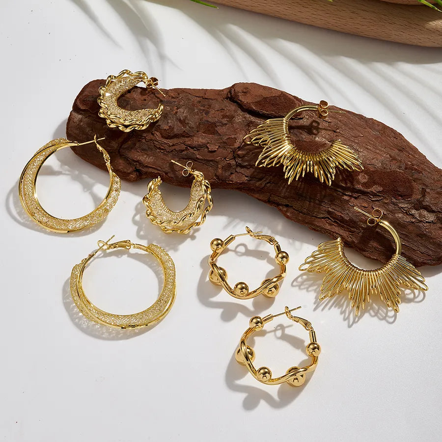 Gold Twisted Water Diamond Hoop Earrings