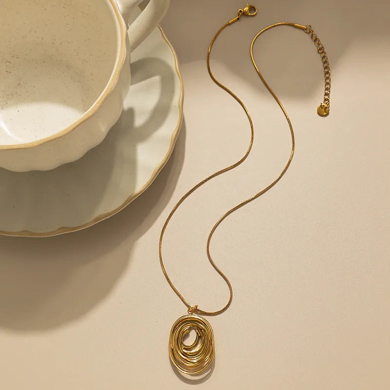 Gold Geometric Spiral Pendant Necklace