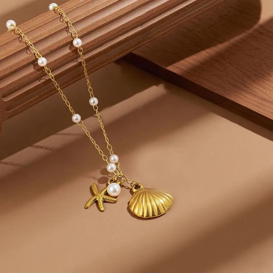 Gold Heart Shell Pendant Necklace X0181-Pearl Starfish Shell Necklace- Gold