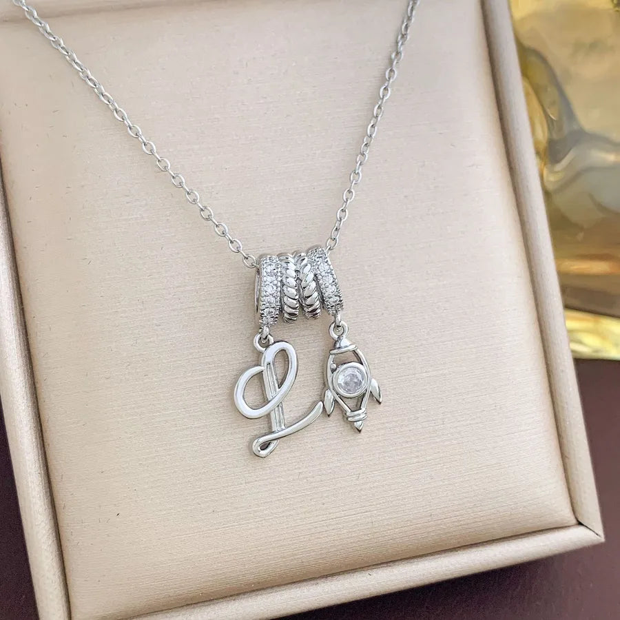 Aurora Star Pendant Necklace – Titanium & Zircon XL4466 Little Rocket Initial Necklace Silver