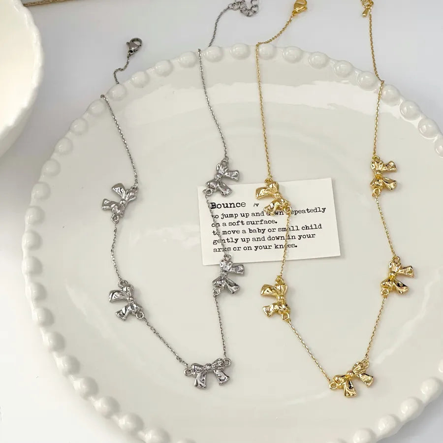 Gold Plated Butterfly Knot Pendant Necklace