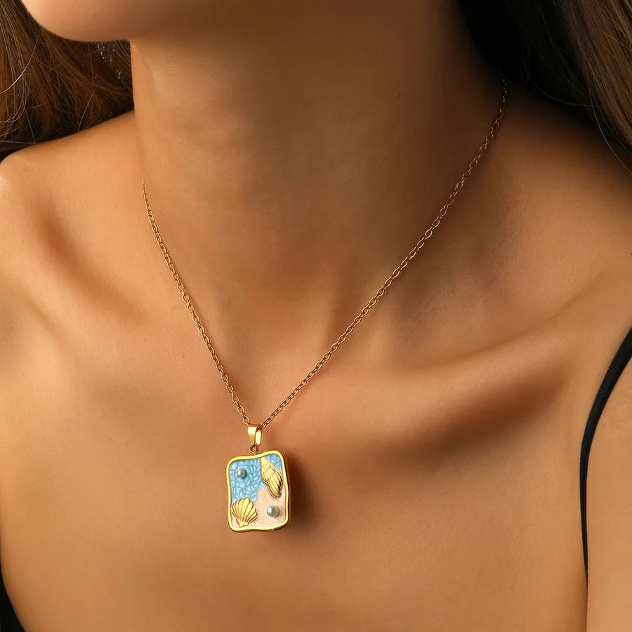 Gold Shell Pendant Necklace with Pearl Charm