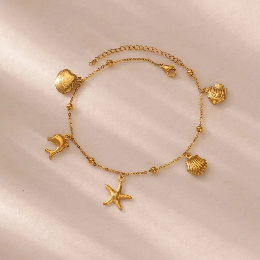 Gold Ocean Anklet with Dolphin & Starfish Charms