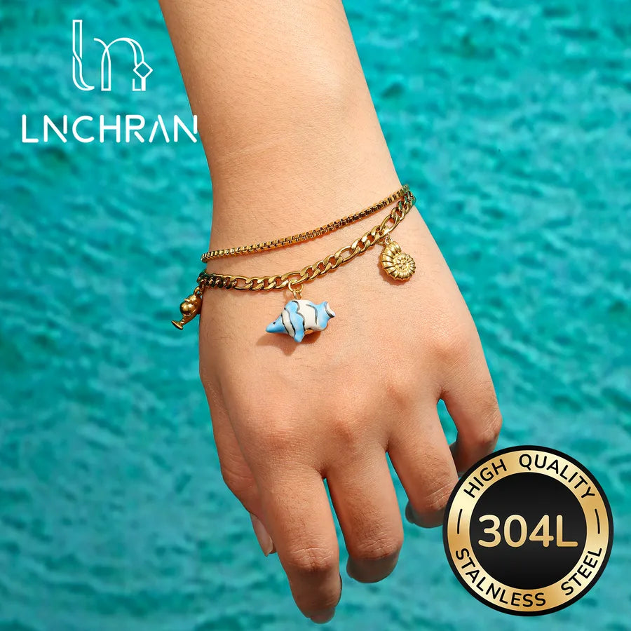 18K Gold Dolphin & Fish Charm Bracelet Gold