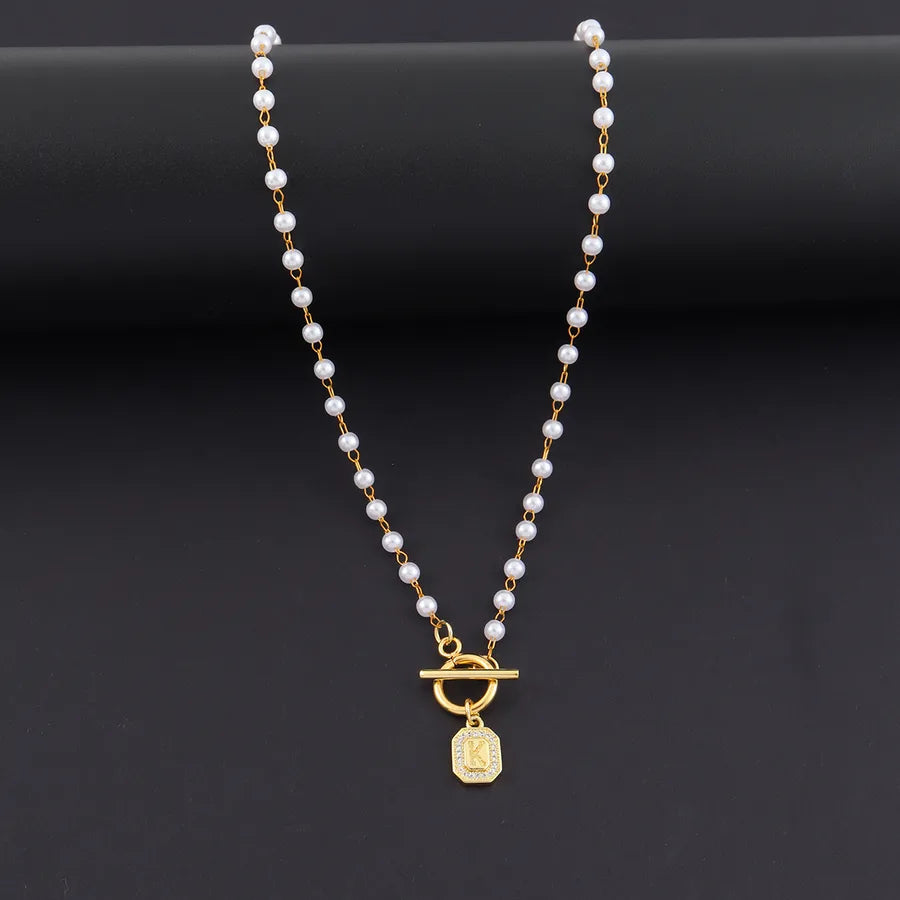 Elegant Pearl Initial Pendant Necklace