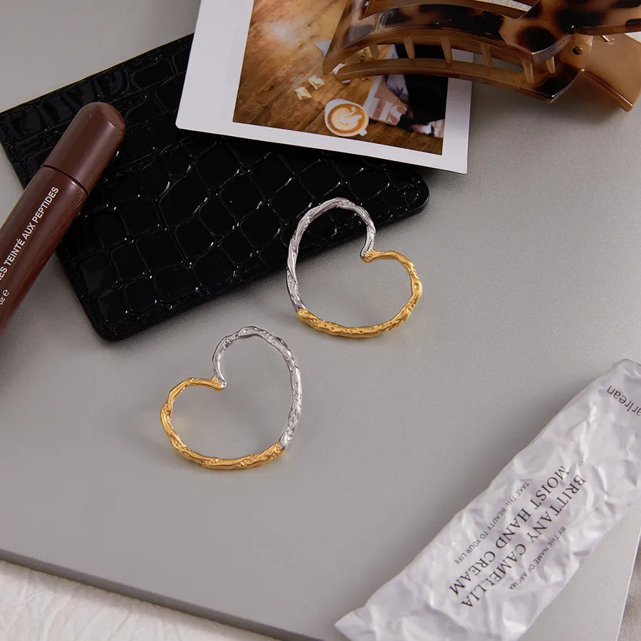 Gold & Silver Twisted Heart Earrings