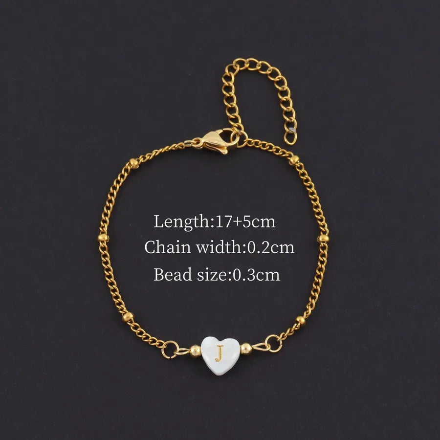 Gold Heart Initial Bracelet with Shell Charm Gold j