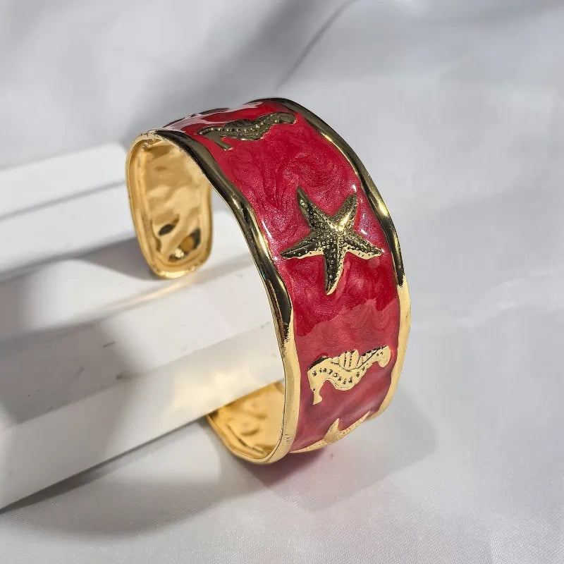 Gold Starfish & Seahorse Stainless Steel Bangle Red