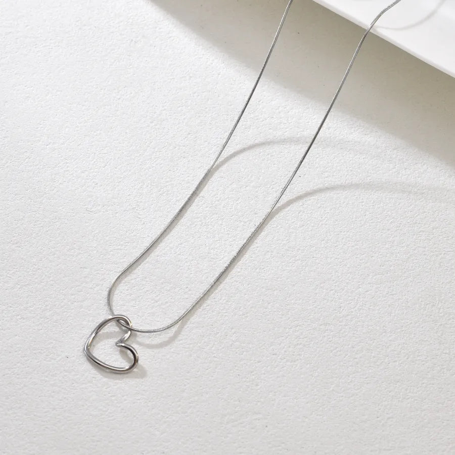 Gold Twisted Heart Pendant Necklace