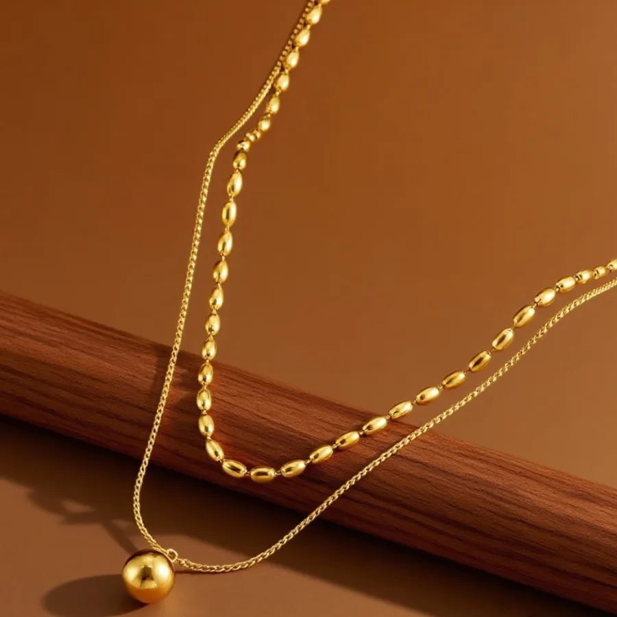 Elegant Titanium Steel Pendant Necklace X0443-Double-layered Ball Necklace- Gold