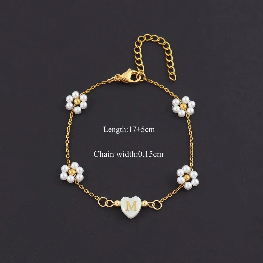 18K Gold Plated Heart & Pearl Bracelet Gold m