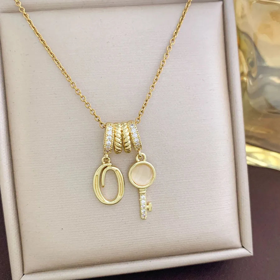 Aurora Star Pendant Necklace – Titanium & Zircon XL4813 Key Letter O Combination Necklace Gold