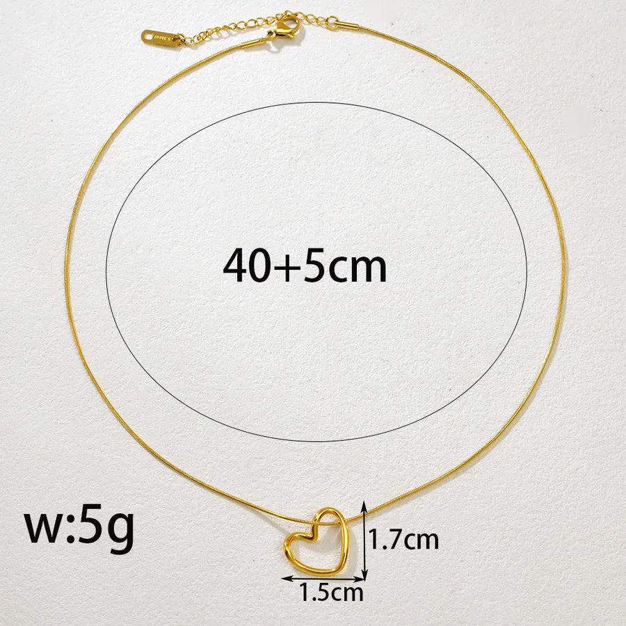 Gold Twisted Heart Pendant Necklace